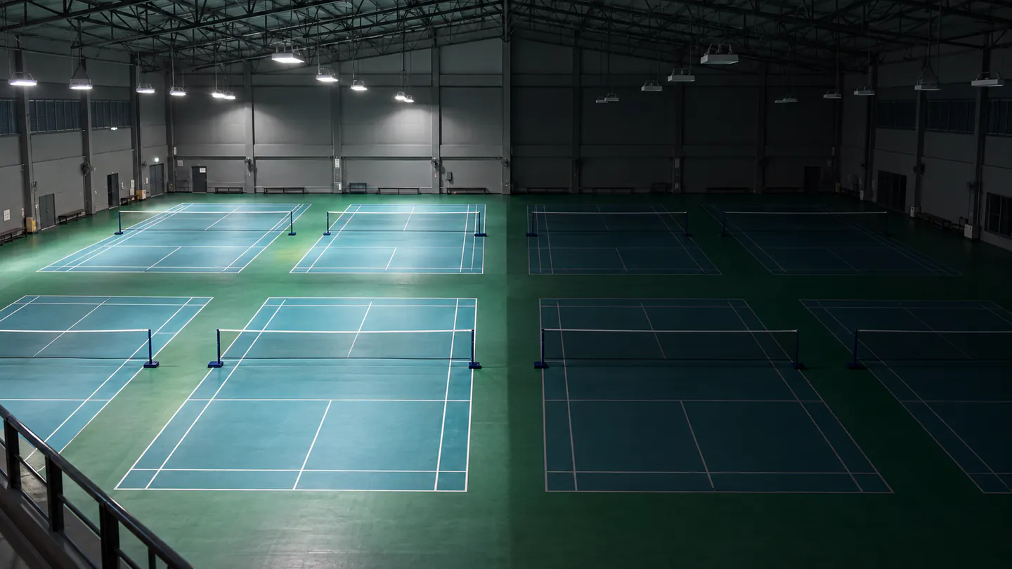 Indoor courts with separate illuminated and unlit areas