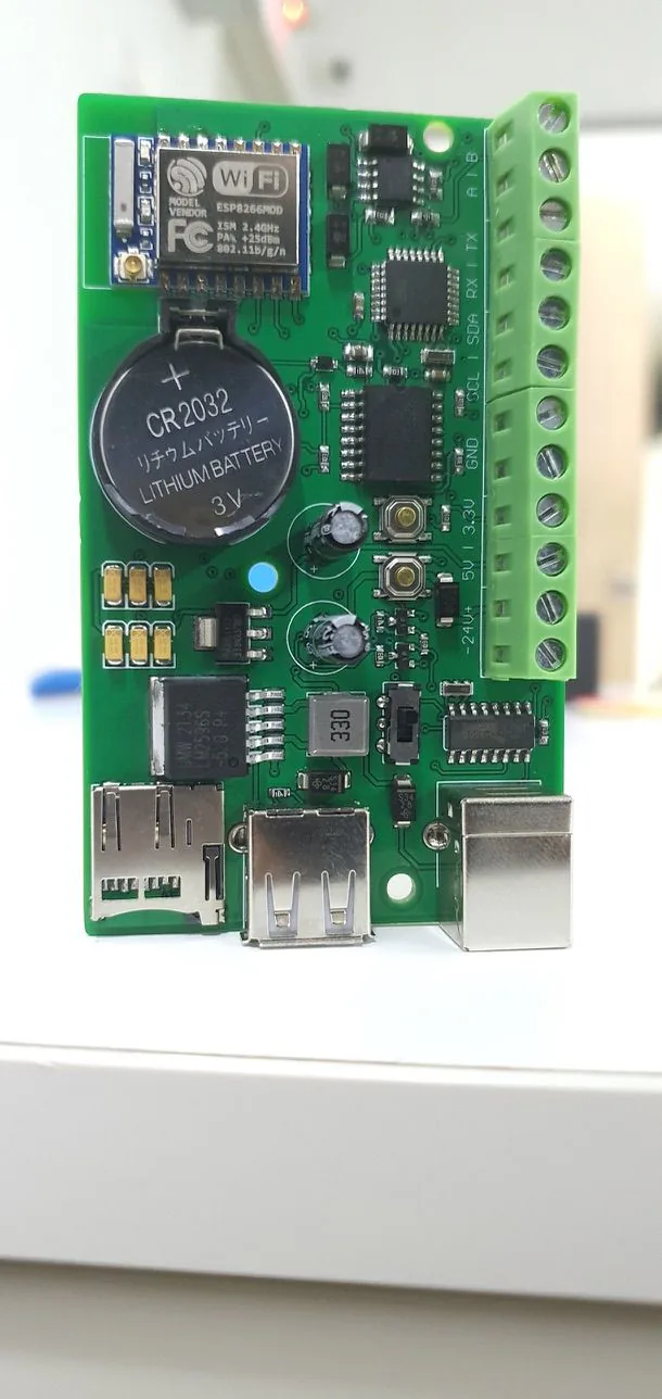 Custom ESP8266 agriculture sensor-node PCB with coin-cell holder, memory-card slot and labelled terminal connections